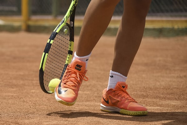 Tennis player on clay court